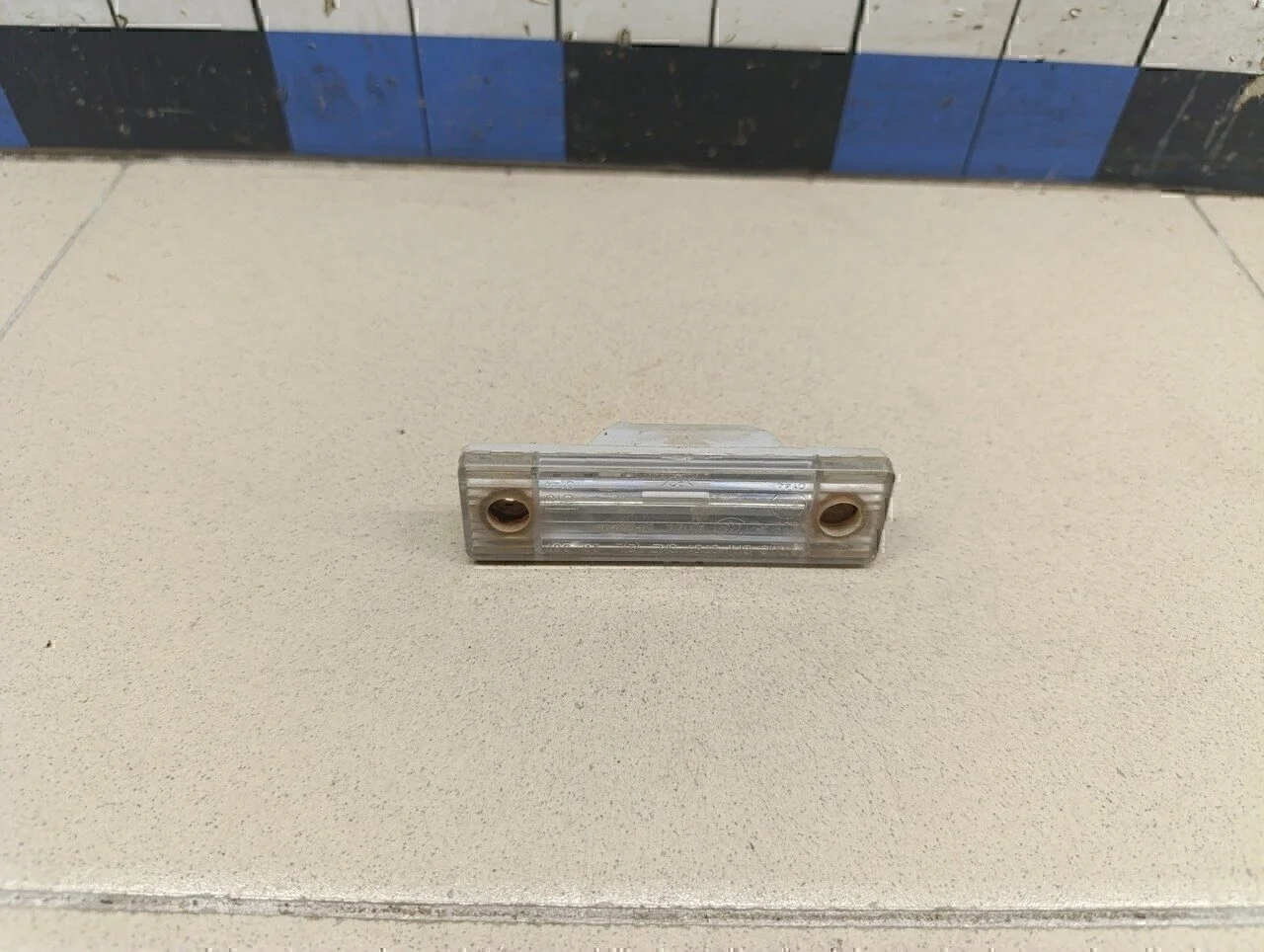 Фонарь подсветки номера Aveo (T200) 2003-2008