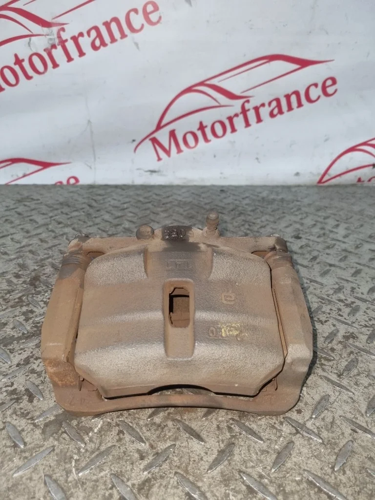 Суппорт тормозной Nissan Qashqai 2011 41011JD00A J10, передний левый