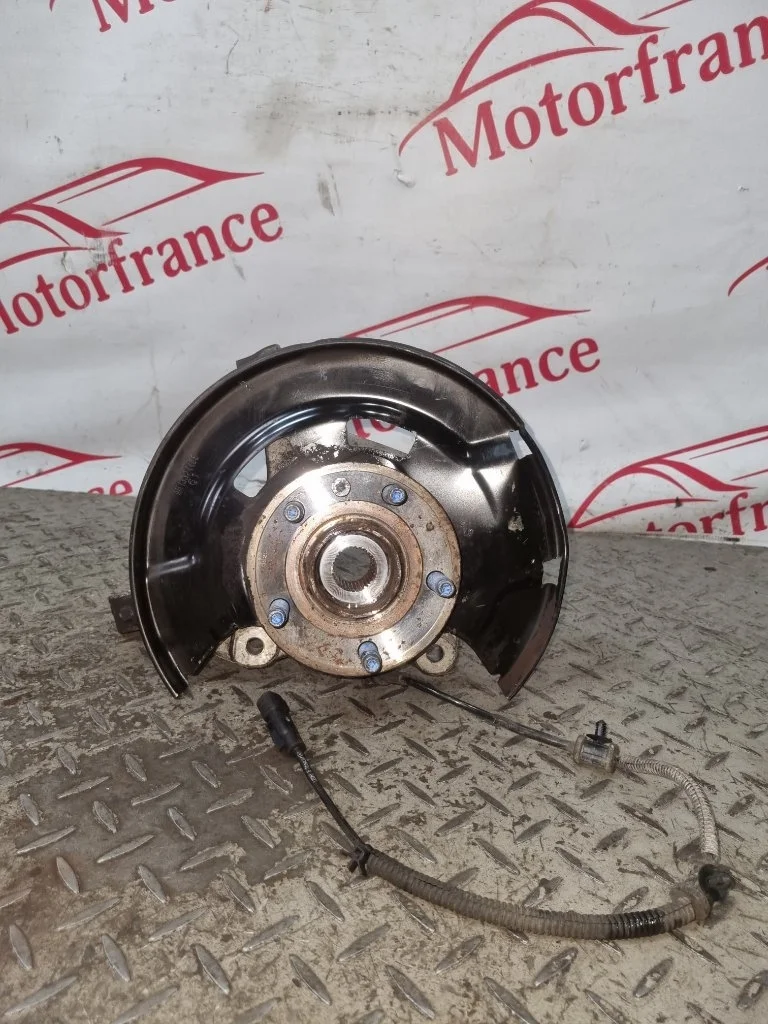 Кулак поворотный Opel Astra 13583478 J, передний левый