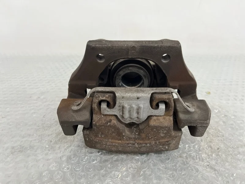 Суппорт тормозной BMW X5 2011 34216776787 E70 N55B30, задний левый