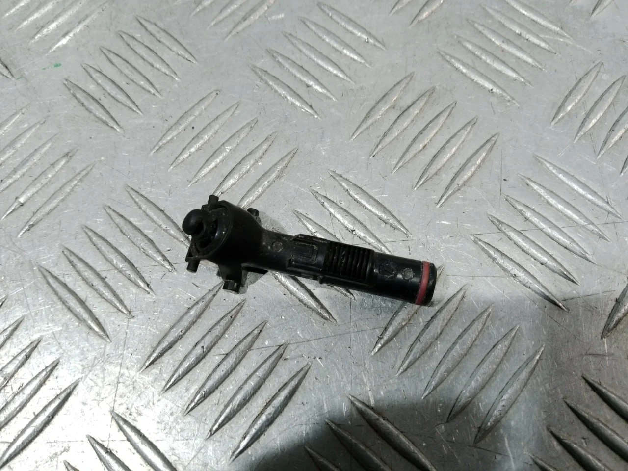 [Б/У] Форсунка омывателя фары левая [Код: 00669145 ]