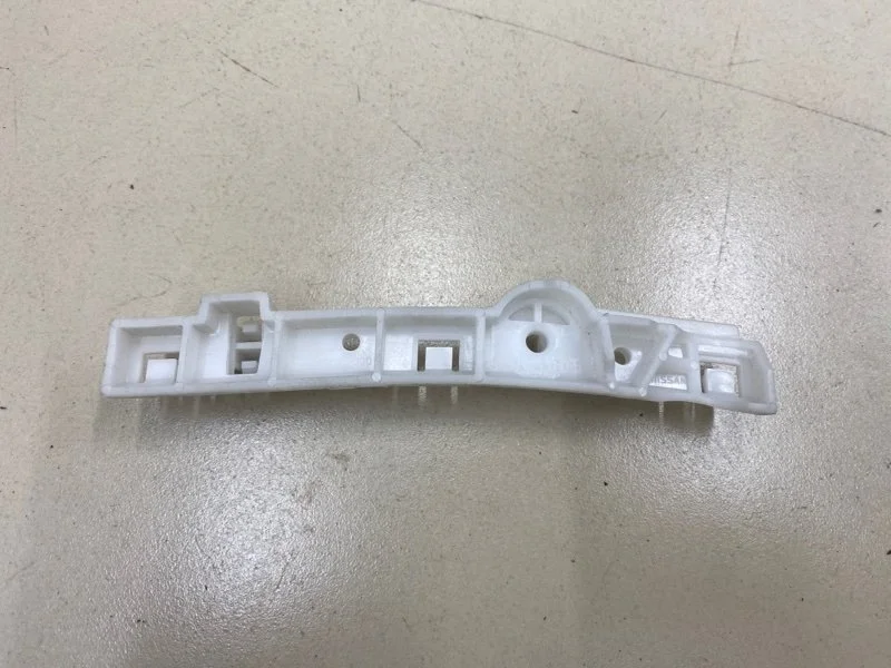 Кронштейн бампера передний левый Nissan Note 1 E11