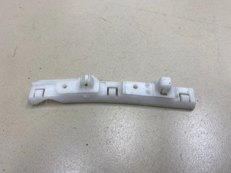 Кронштейн бампера передний левый Nissan Note 1 E11