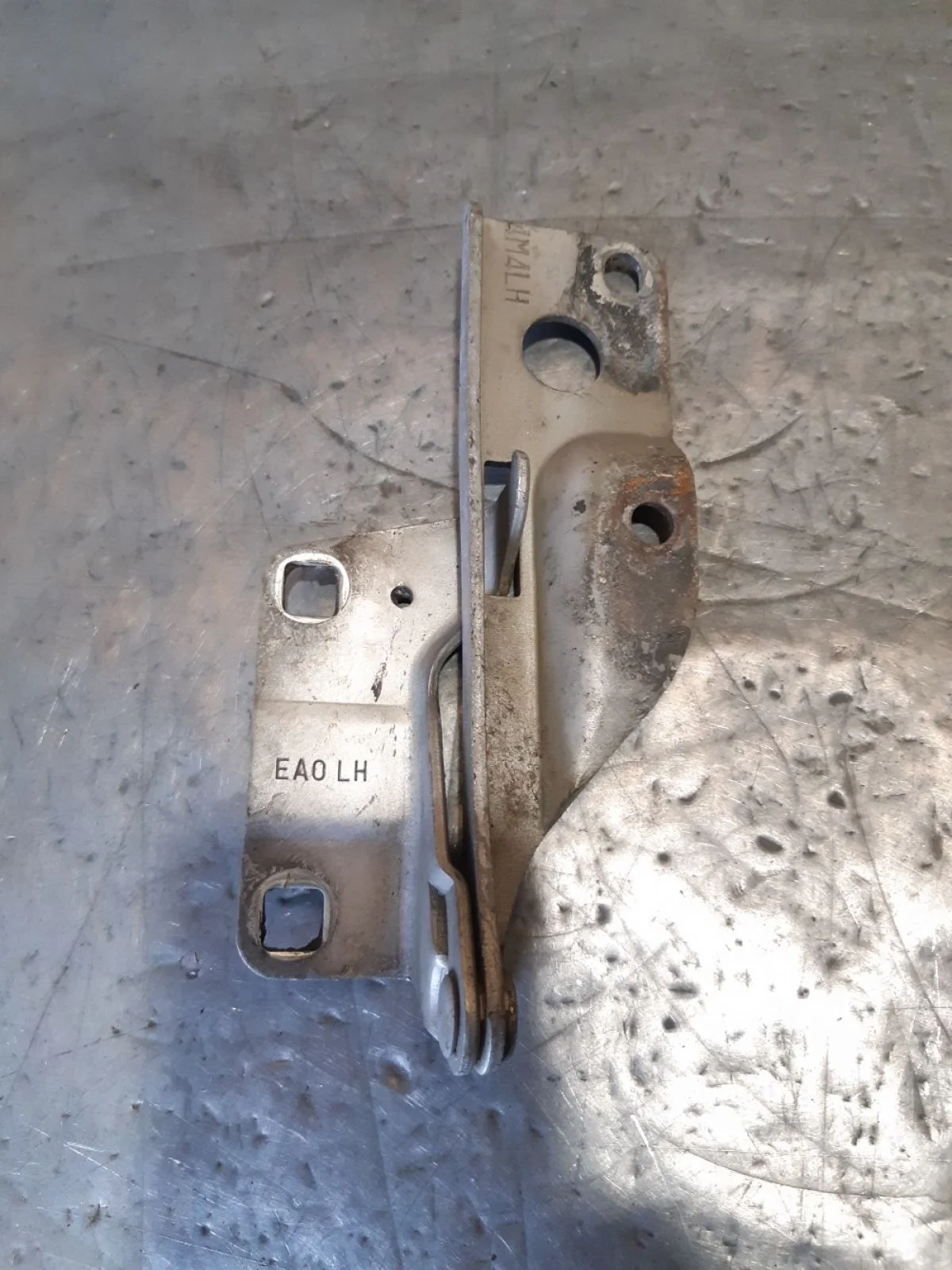 Петля капота левая Nissan Navara D40 (2004—2010) 2008 серебристый