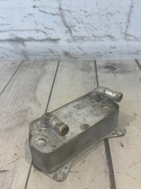 Радиатор масляный Audi A3