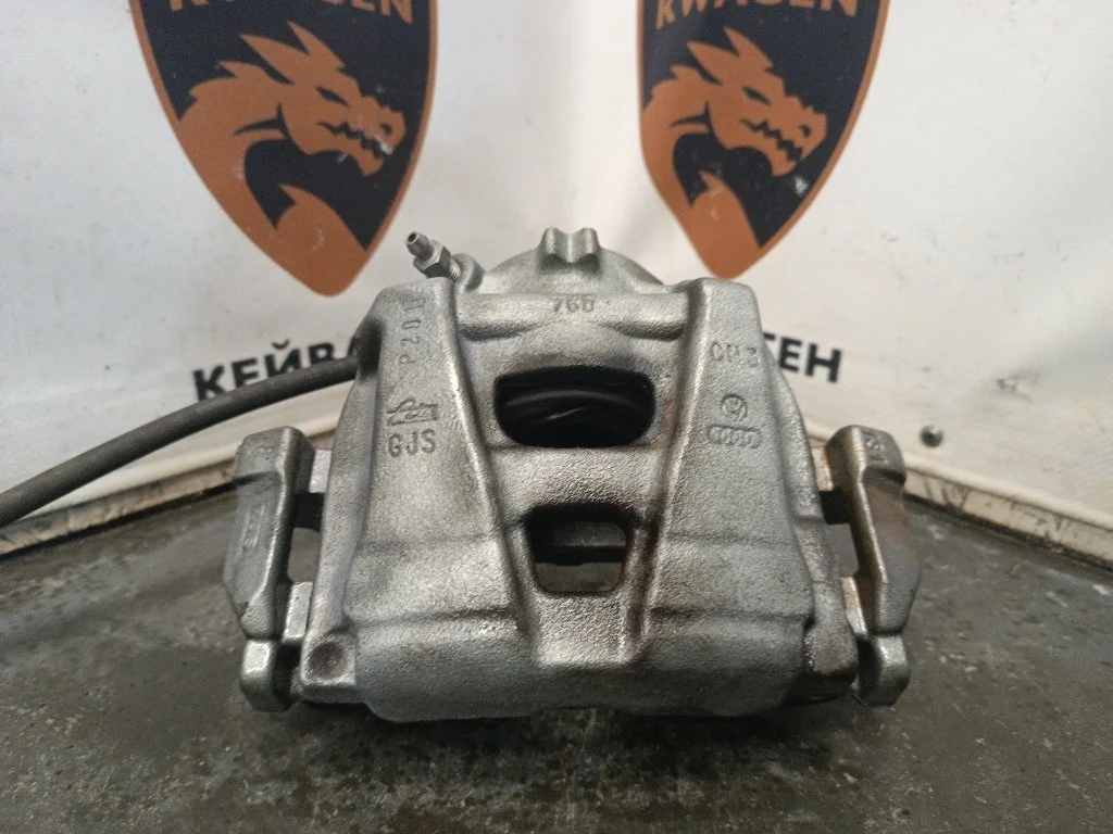 Суппорт тормозной Volkswagen Tiguan 2011 5N