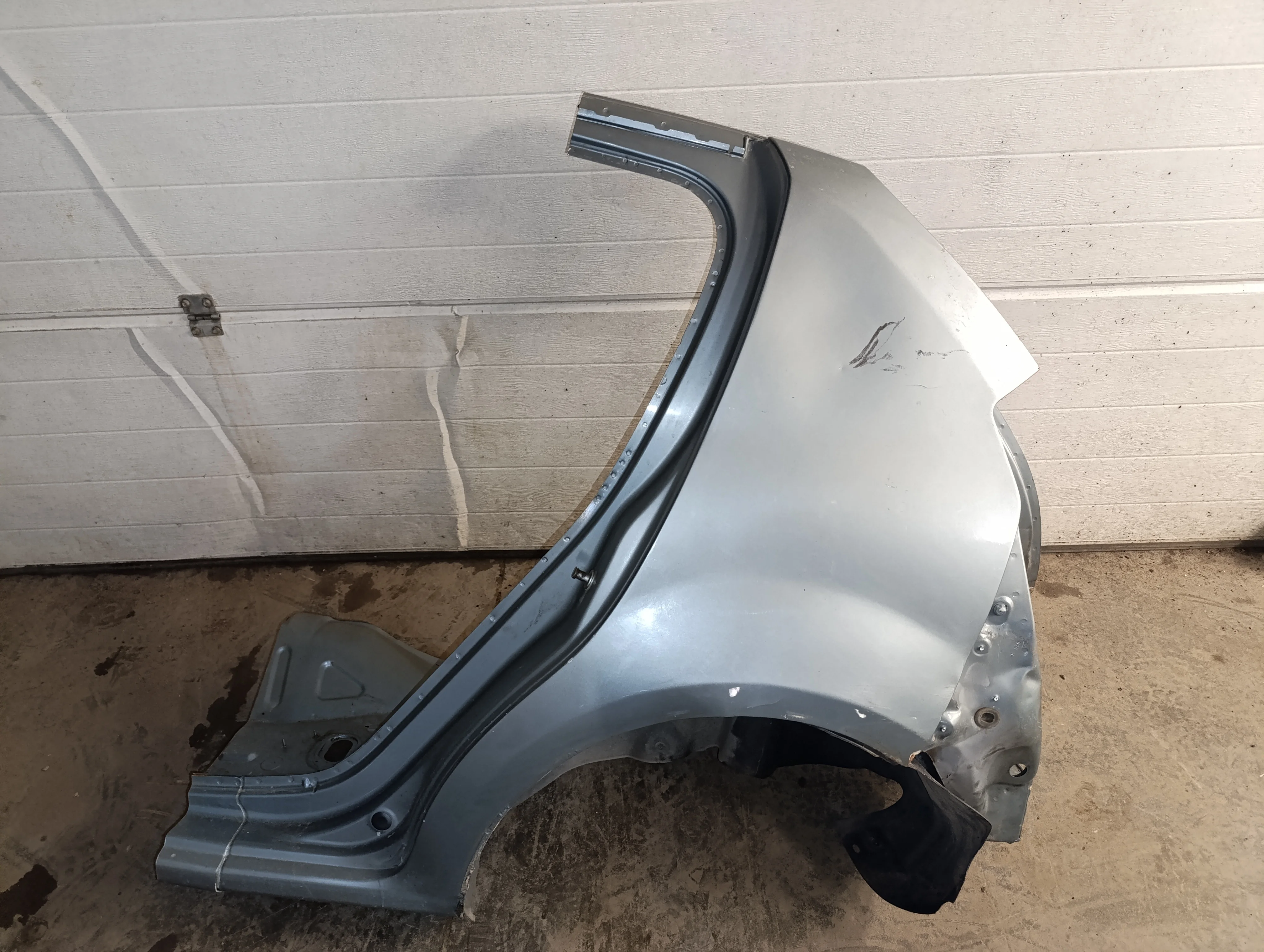 Крыло заднее левое Sandero 2009-2014