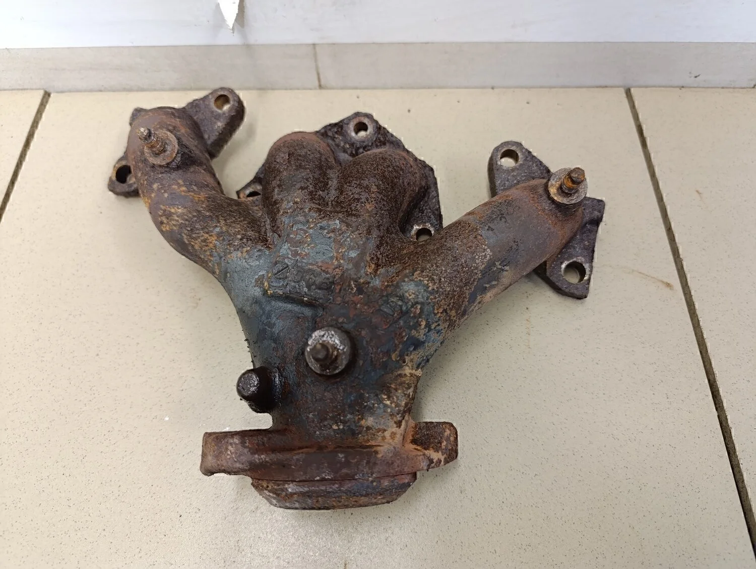 Коллектор выпускной Logan 2005-2014