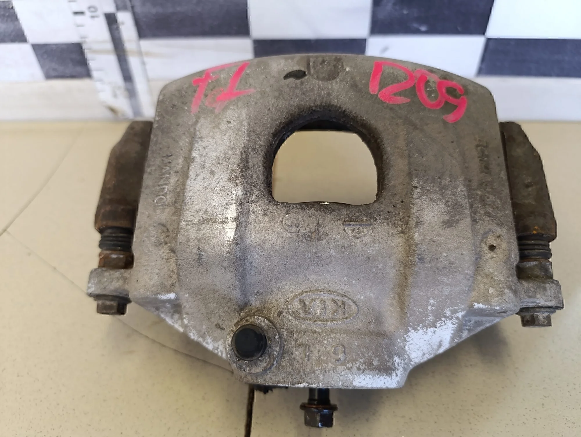 Суппорт передний левый Cerato 2004-2008