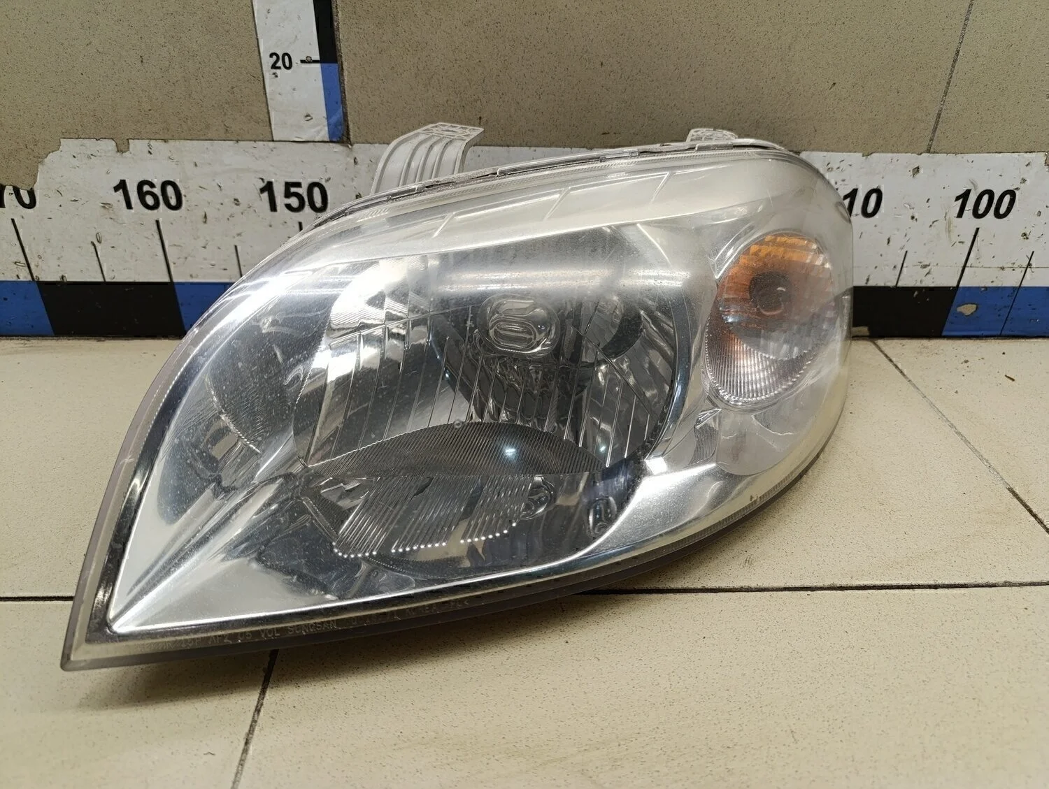 Фара левая Aveo (T250) 2005-2011