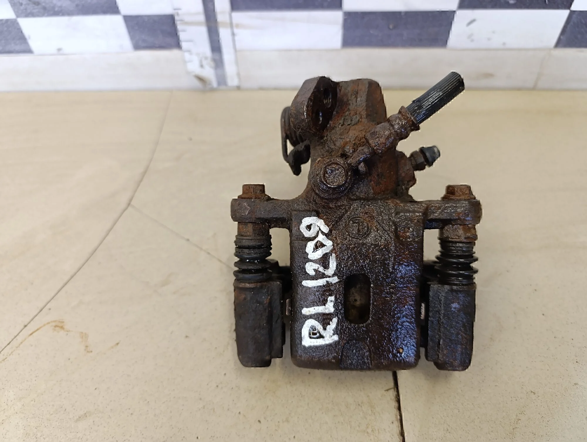 Суппорт задний левый Cerato 2004-2008