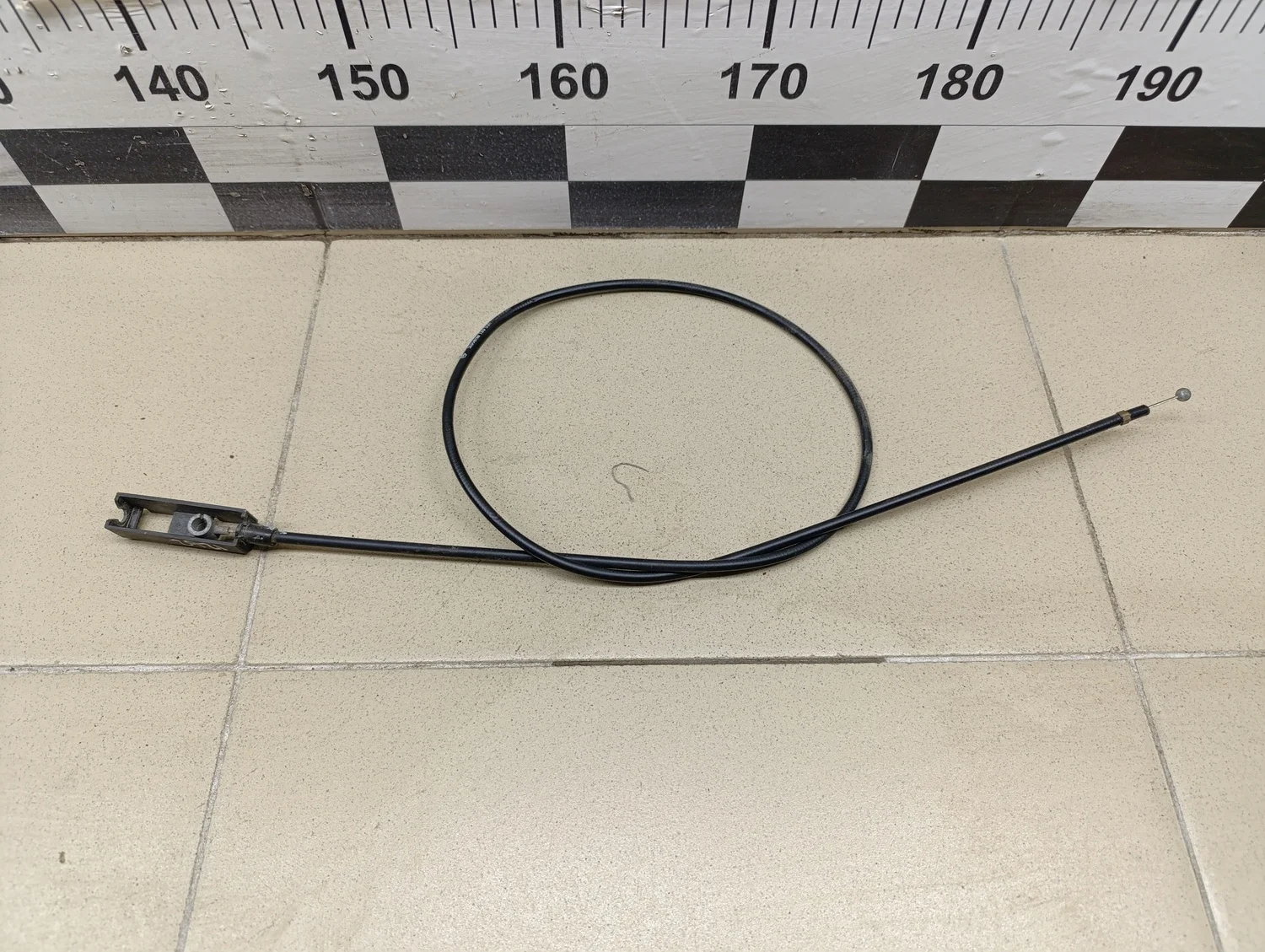 Трос открывания капота Rapid 2013>