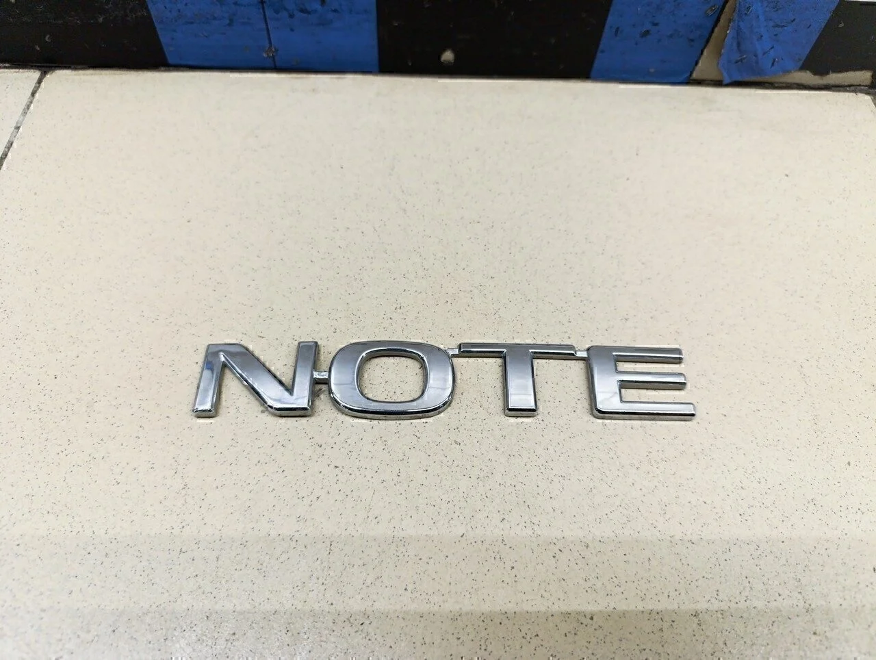 Эмблема Note (E11) 2006-2013