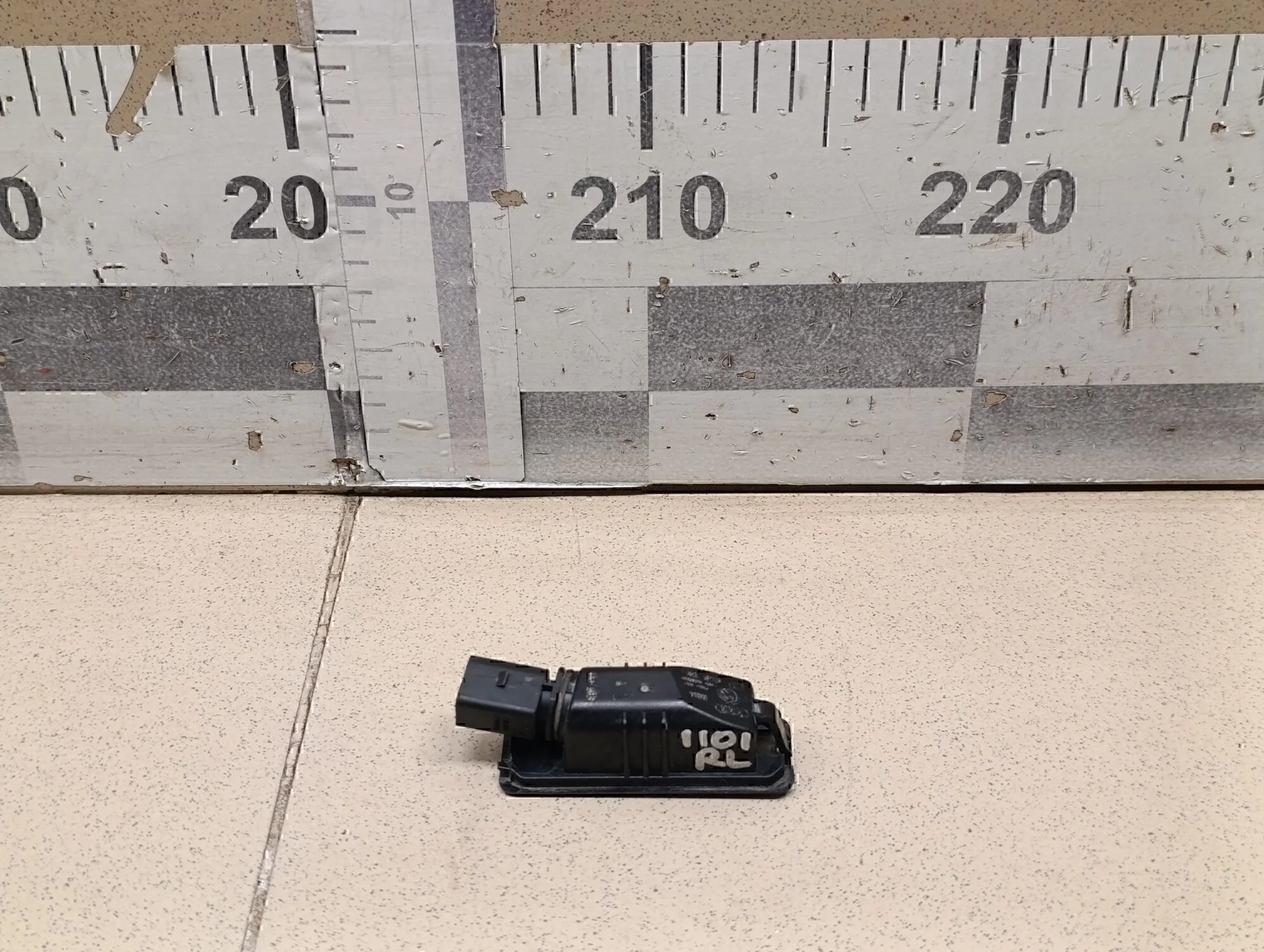 Фонарь подсветки номера Golf VII 2012>