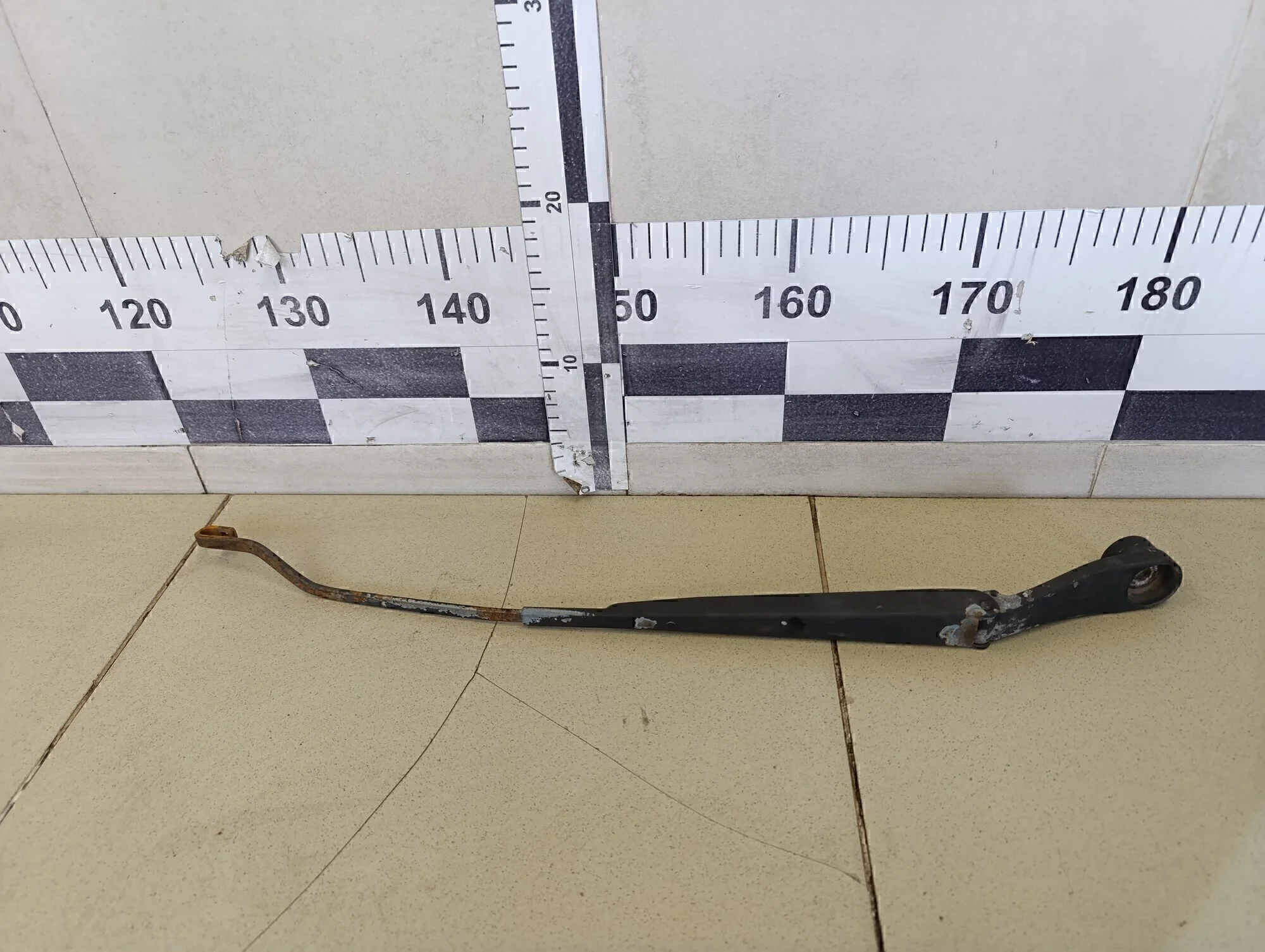 Поводок стеклоочистителя передний левый Cerato 2004-2008