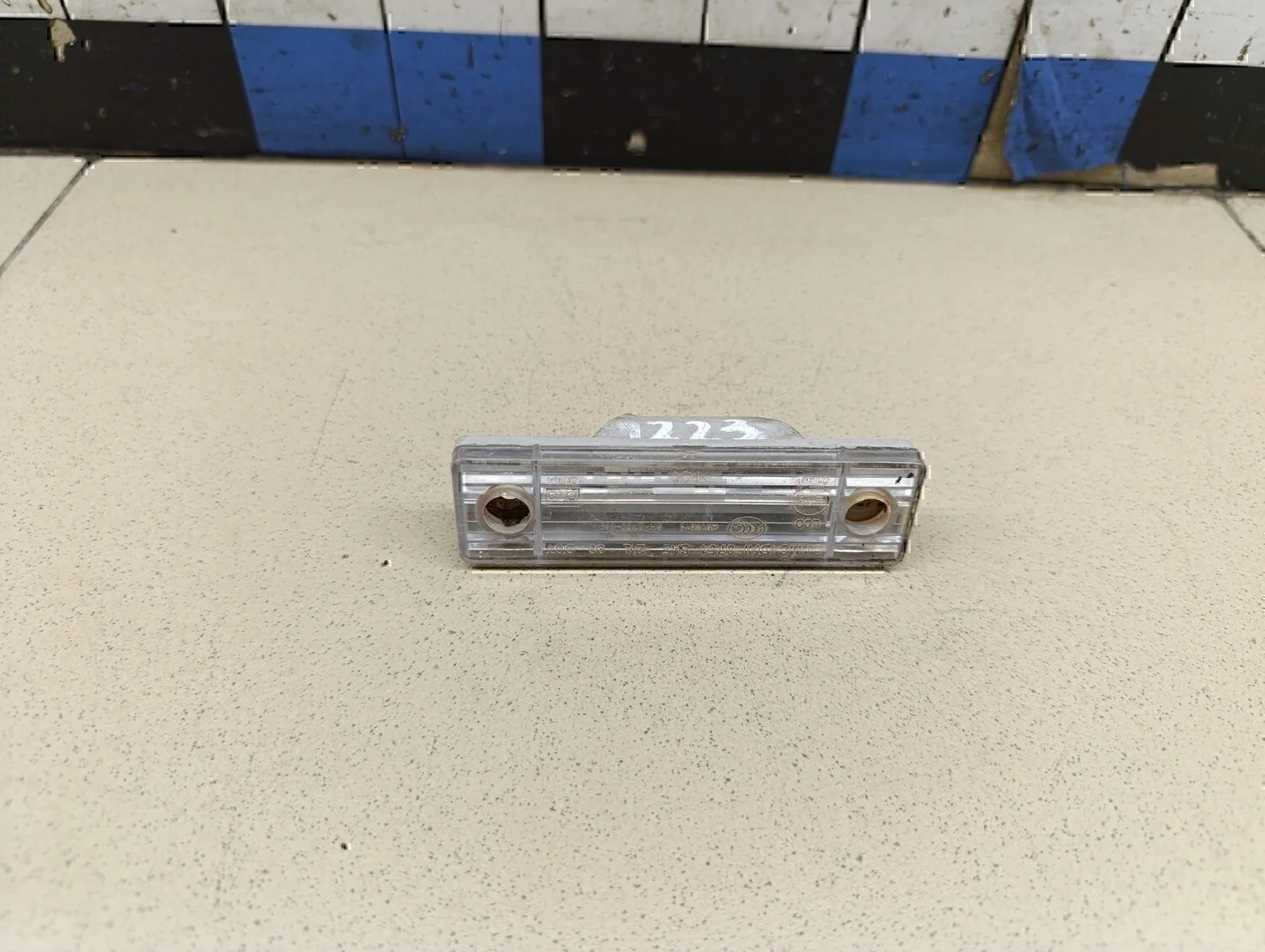 Фонарь подсветки номера Aveo (T200) 2003-2008