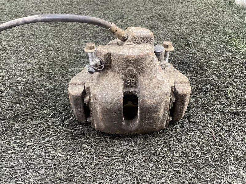 Суппорт тормозной BMW X5 2005 34116773131 E53 M57D30, передний левый