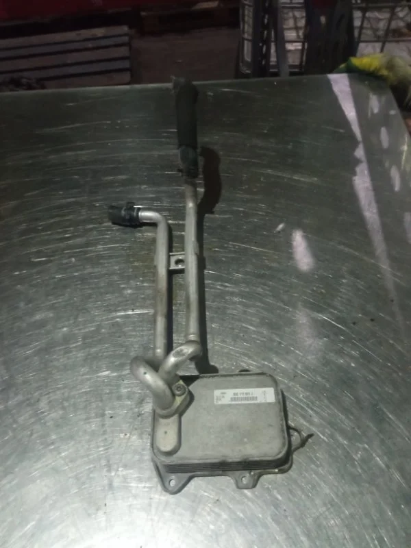 Радиатор масляный Audi A3