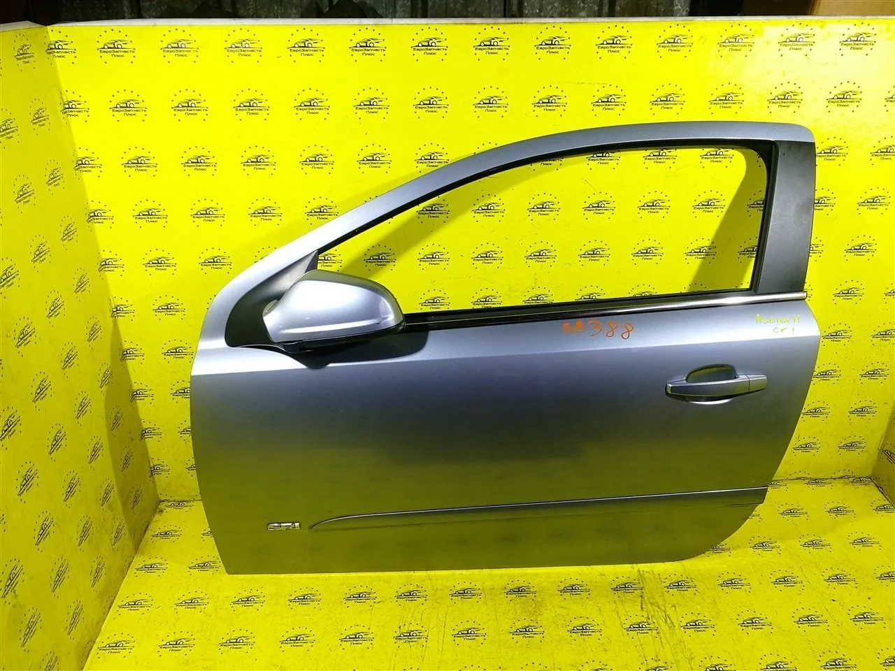 Дверь Opel Astra H GTC 13168043 3D, передняя левая