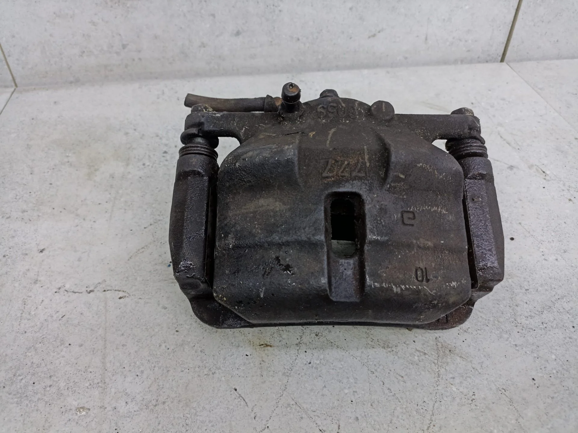 Суппорт тормозной передний правый Nissan X-Trail