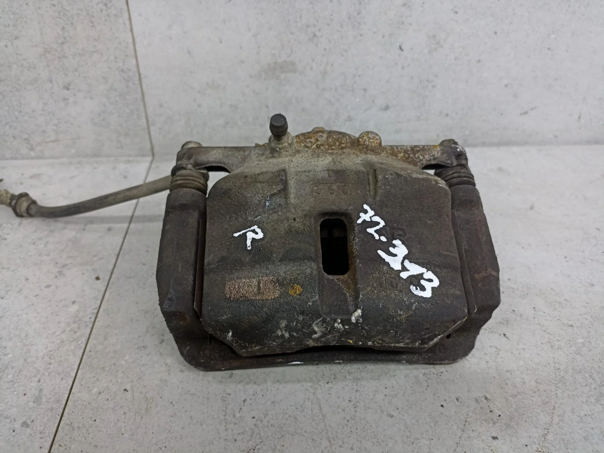 Суппорт тормозной передний правый Nissan X-Trail