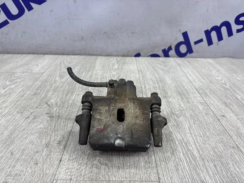 Суппорт тормозной Mitsubishi Pajero 2010 V75W