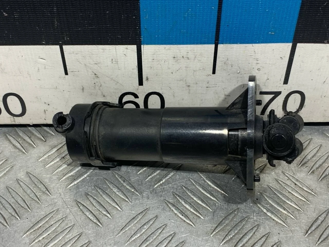 [Б/У] Форсунка омывателя фары правая Audi Q7 - (Состояние: сломан штутцер) [Незначительные дефекты] [Код: 00676032 ]