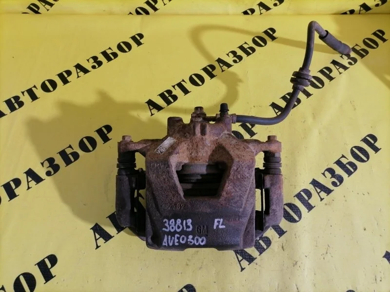 Суппорт передний левый CHEVROLET AVEO T300 2011-2015 2013 96418871 СЕДАН 1.6 F16D4 116 Л/С