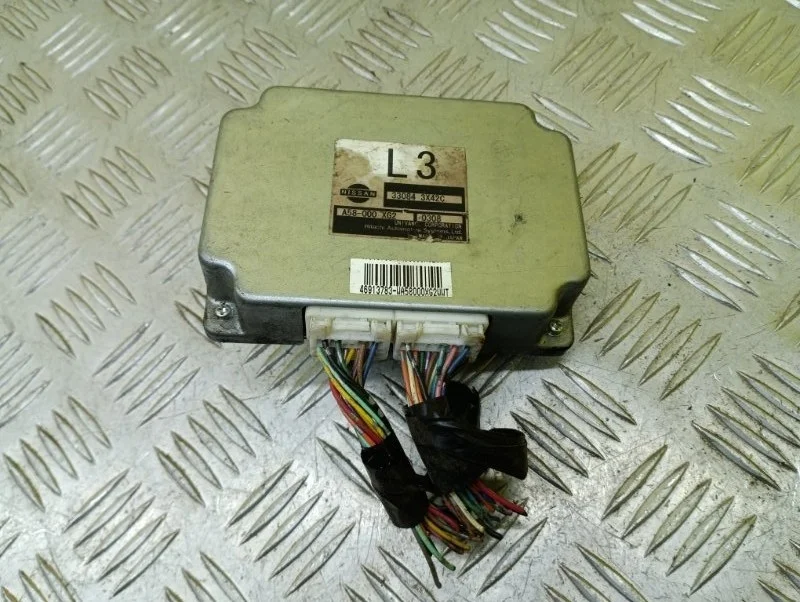 Блок управления АКПП Nissan Navara (D40) 2004-2015 330843X42C