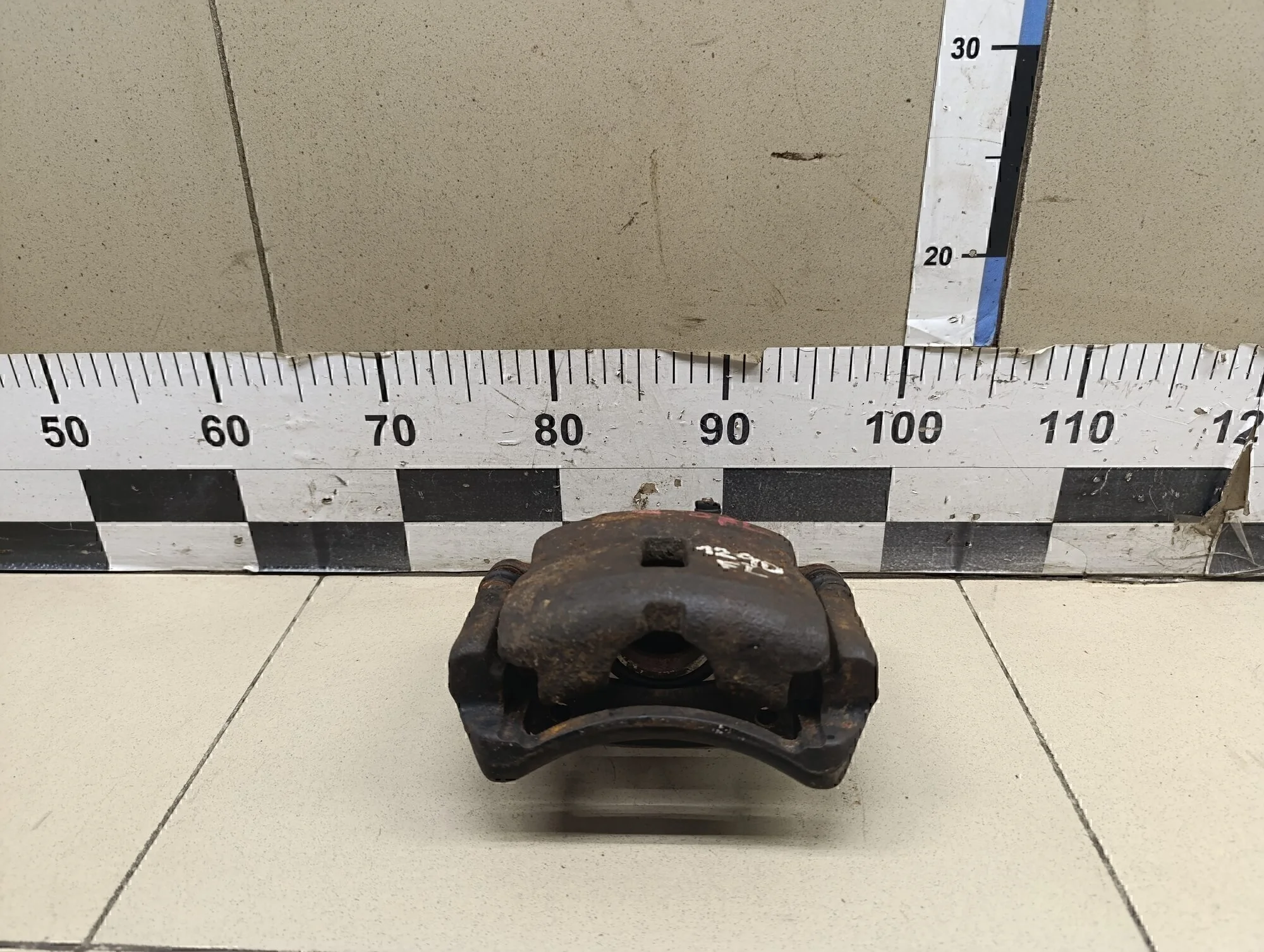 Суппорт передний левый Almera N16 2000-2006