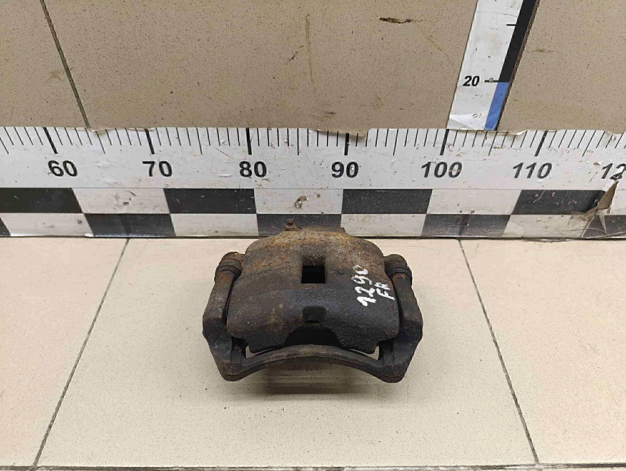 Суппорт передний правый Almera N16 2000-2006