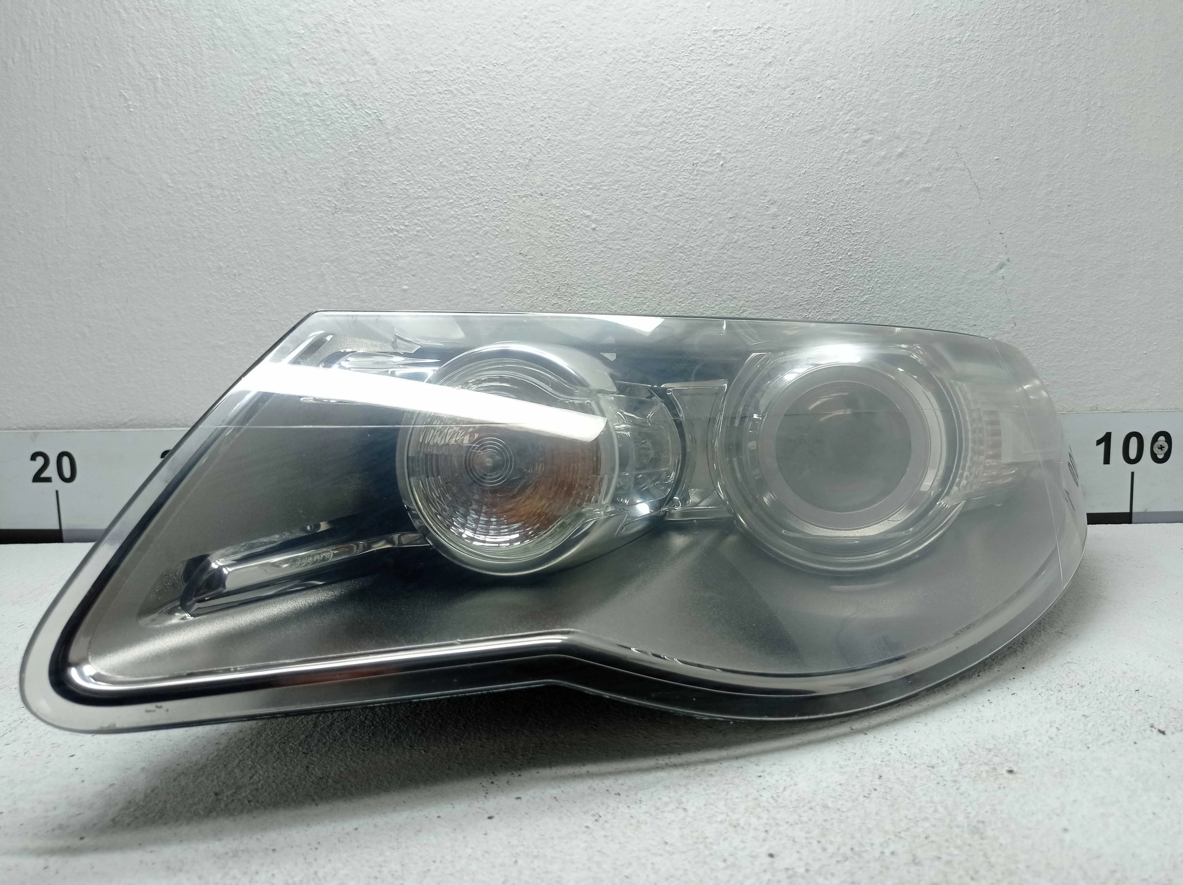 Фара левая Volkswagen Touareg I  Рестайлинг (7L) 2007 - 2010 бензин 3.6 Автомат