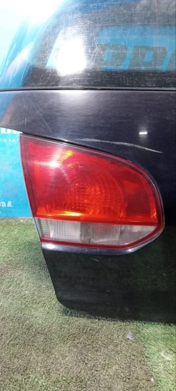 Фонарь двери багажника задний левый Volkswagen