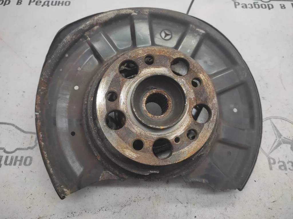 Кулак подвески задний левый Mercedes-Benz