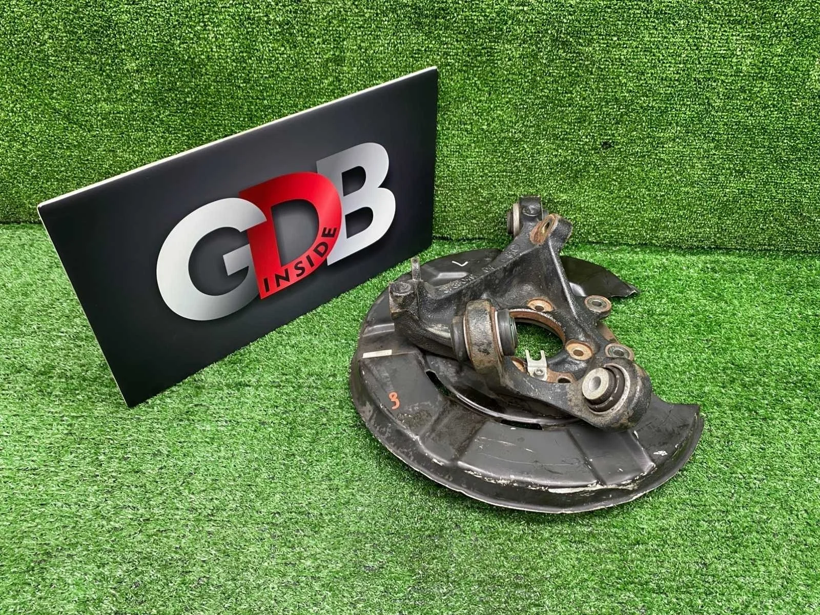 Кулак поворотный BMW X1 10.11.2011 33326788049 E84 N20B20A, задний левый