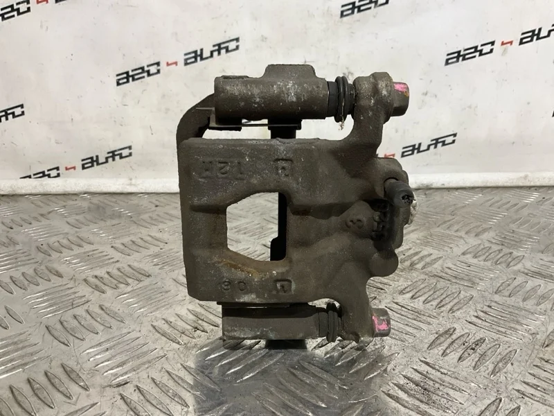 Суппорт тормозной Nissan Juke 2011 440111KD0A MR16DDT, задний левый