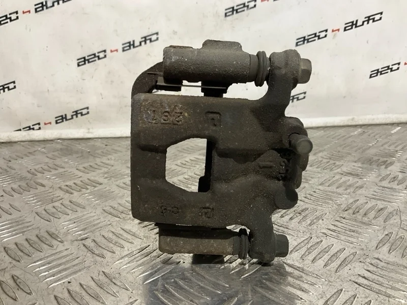 Суппорт тормозной Nissan Juke 2012 440111KD0A MR16DDT, задний левый