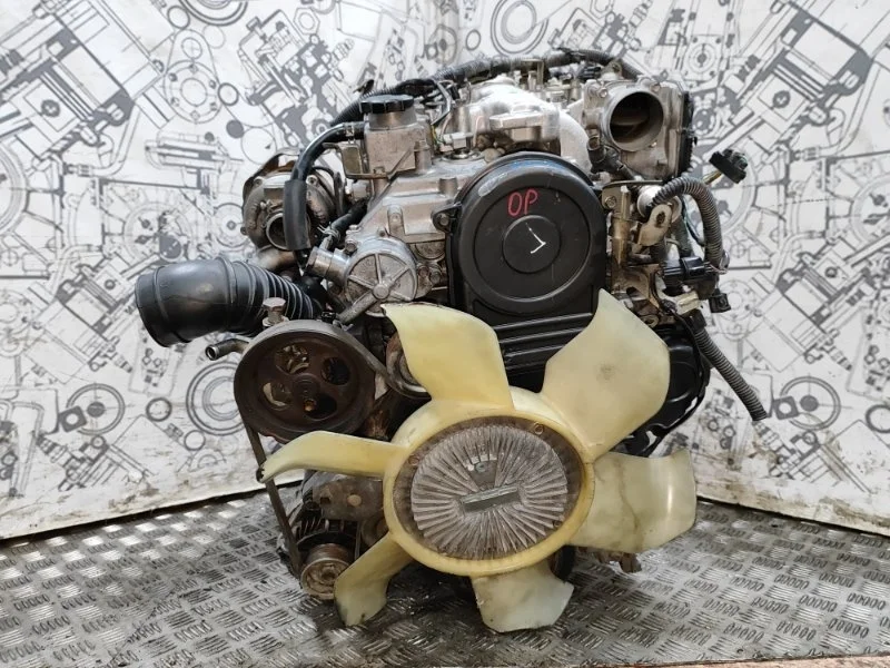 Двигатель Mitsubishi L200 Pajero Sport 1000C753 4D56U