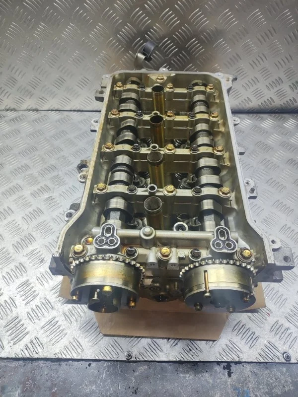 Головка блока цилиндров Toyota Corolla 1110139686 E150 1ZRFE