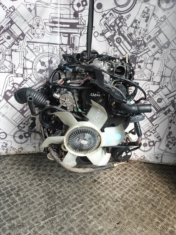 Двигатель Mitsubishi L200 Pajero Sport 1000C753 4D56U