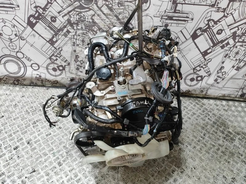 Двигатель Mitsubishi L200 Pajero Sport 1000C753 4D56U