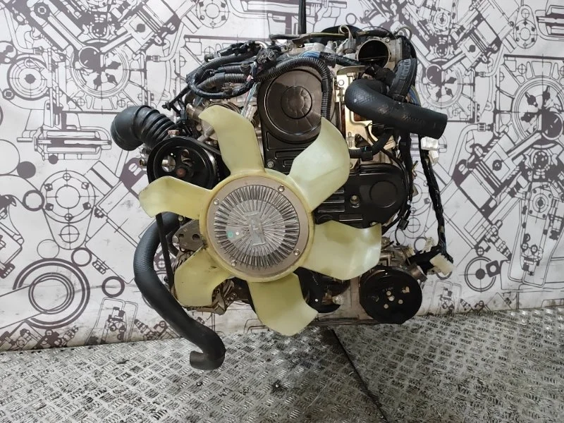 Двигатель Mitsubishi L200 Pajero Sport 1000C753 4D56U