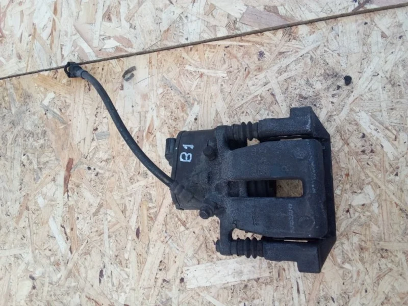 Суппорт тормозной Volvo 36001377, задний правый