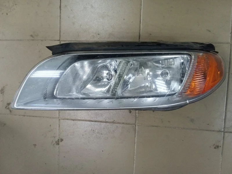 Фара галогеновая Volvo S80 31214353, левая