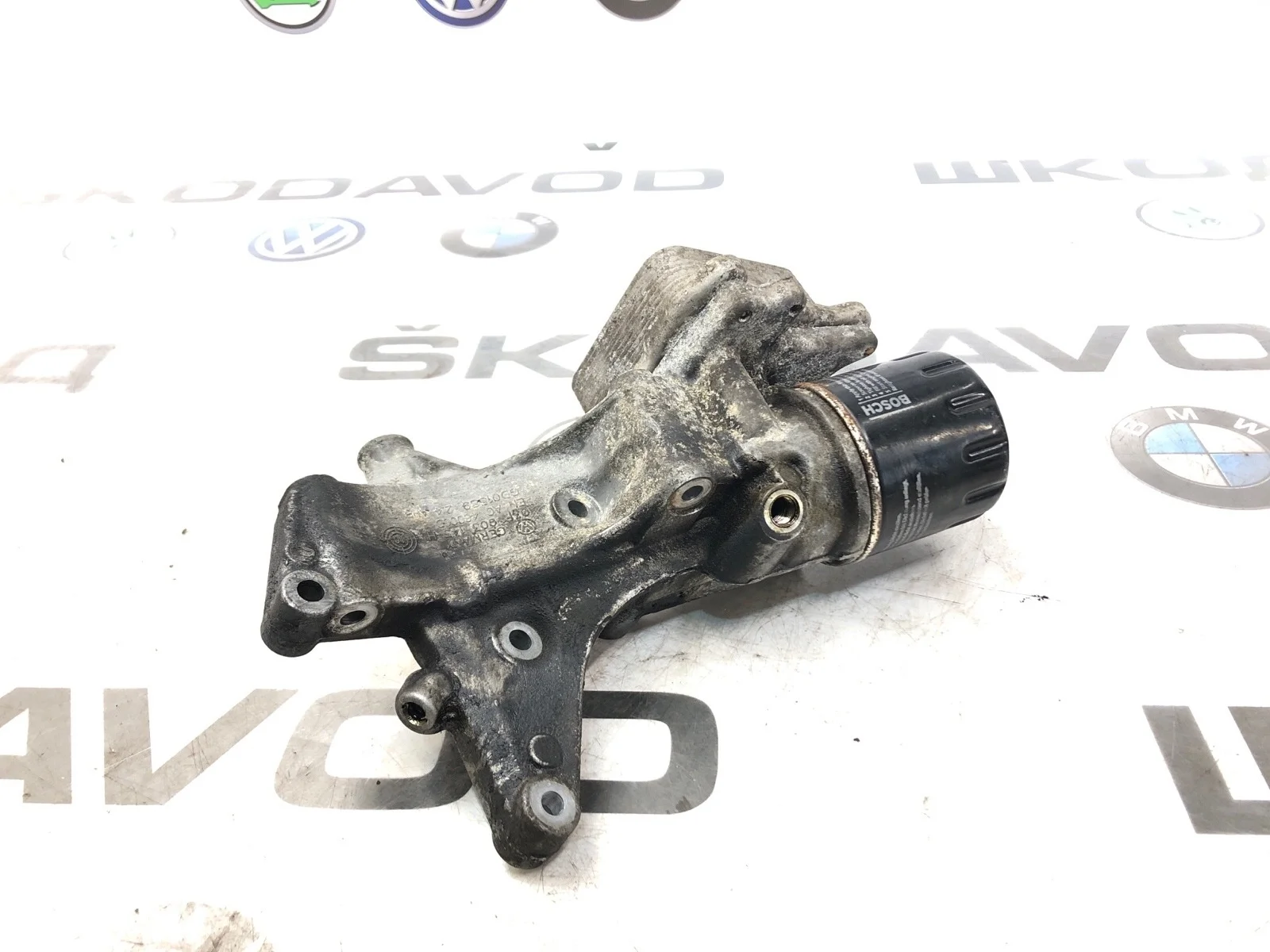 Кронштейн масляного фильтра Skoda Octavia 2011 03F903141F A5 (1Z) 1.2 CBZB