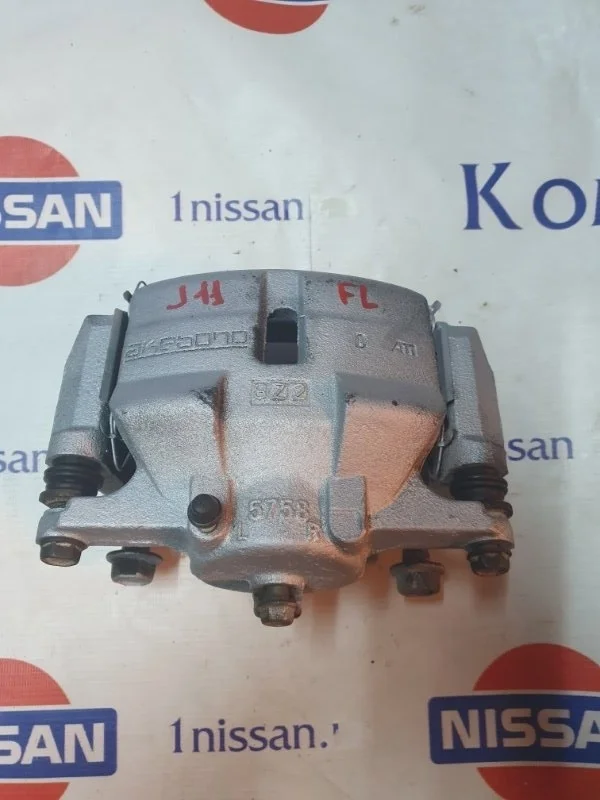 Суппорт тормозной Nissan Qashqai 2020 410114EA0A J11 MR20DD, передний левый