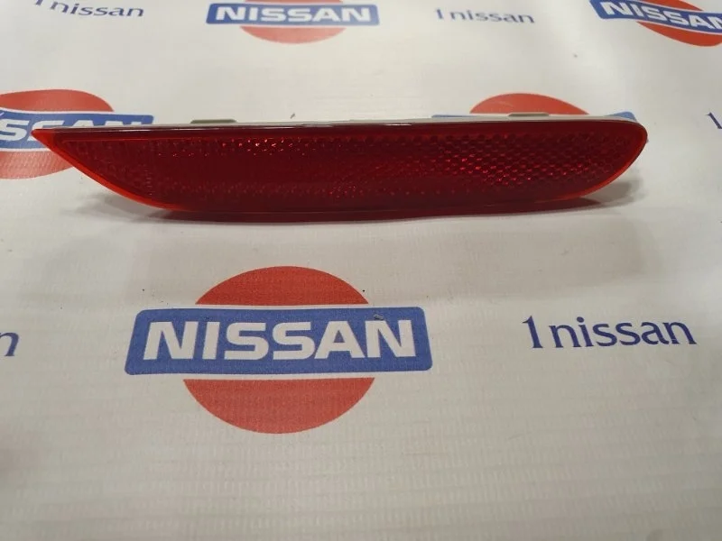 Катафот бампера Nissan 19.03.2023 26560JJ90A, задний правый