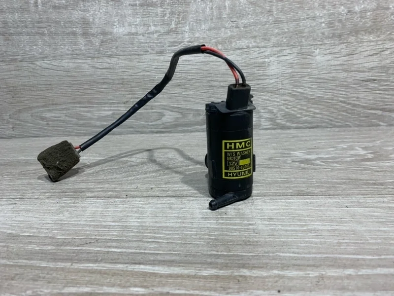 Моторчик бачка омывателя HYUNDAI PORTER 1998-2010 985104B000 1