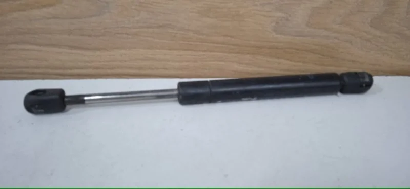 Амортизатор крышки багажника NISSAN PRIMERA 2001-2008 84430AV600 P12