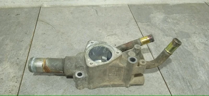 Корпус термостата NISSAN PRIMERA 2001-2008 130499F600 P12